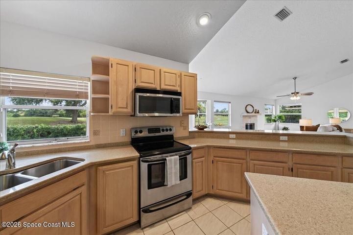 Open concept to the family room and breakfast nook.