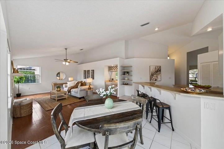 Breakfast nook with view of breakfast bar