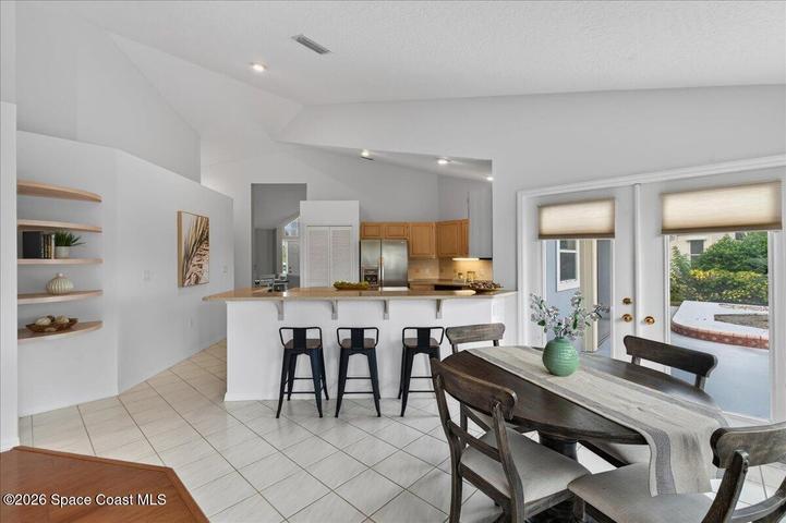 Breakfast nook with view of breakfast bar