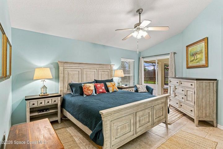 Primary Bedroom has sliders to pool patio