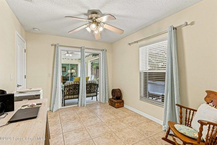 Sliders from Bedroom #4 open to pool and patio
