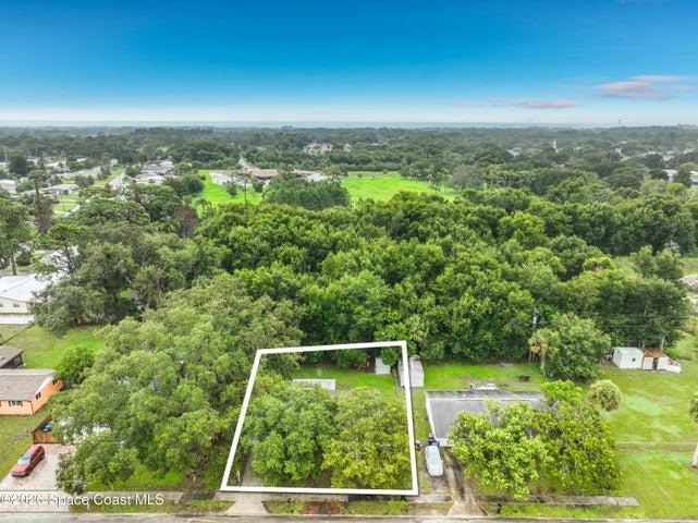 vacant land behind the house.