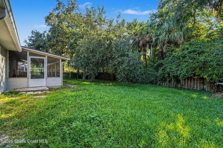 sideyard view of backyard