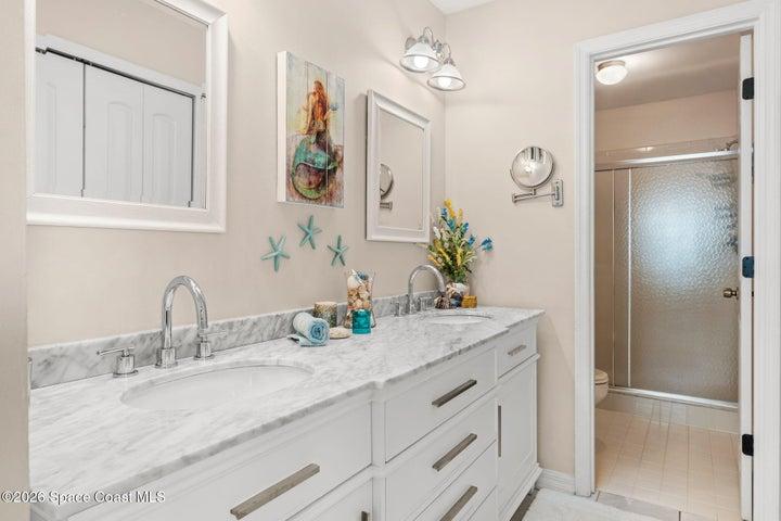 Updated Vanity W/ Dual Sinks, White Cabinets, Marble Countertops