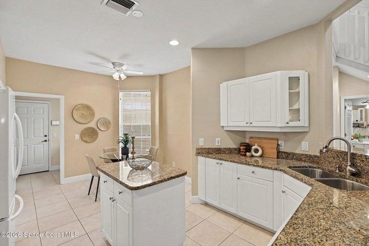 Kitchen And Eat In Area
