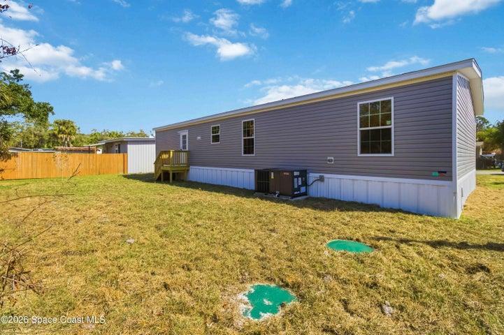 Rear of house & backyard