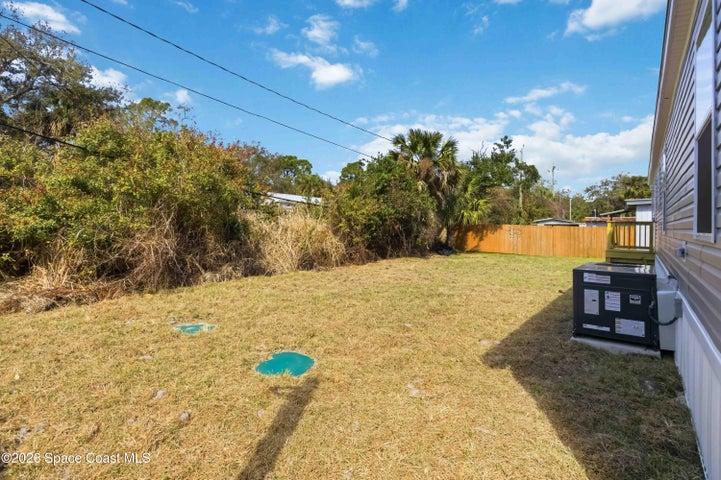 Rear of house & backyard