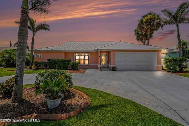 209 Chalet Ave, Indialantic, Florida at dusk