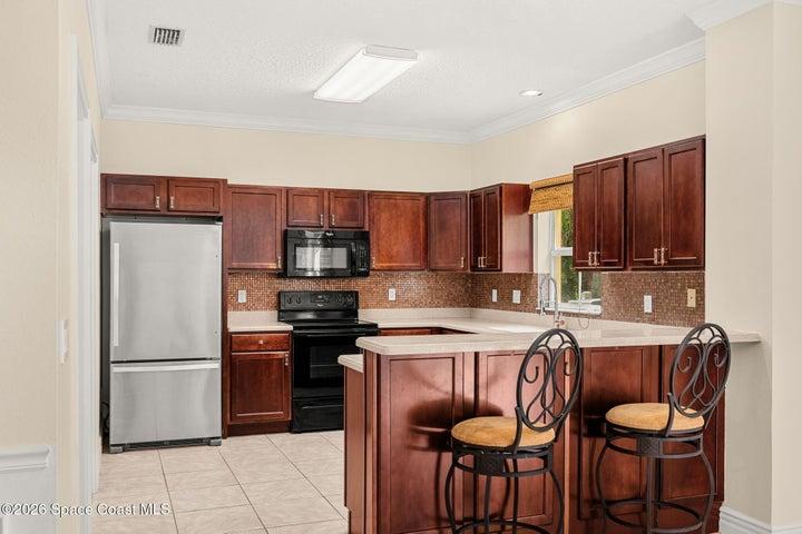 Bar Height Countertop for morning coffee or evening refreshments.