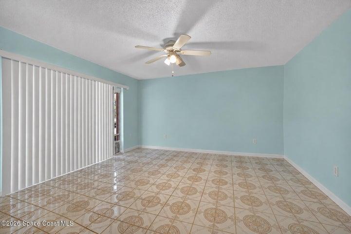 Flex- Bonus Room! Virtually Cleared - (Being Used as Office & for Moving Prep) - Sliders to Screened Lanai Area