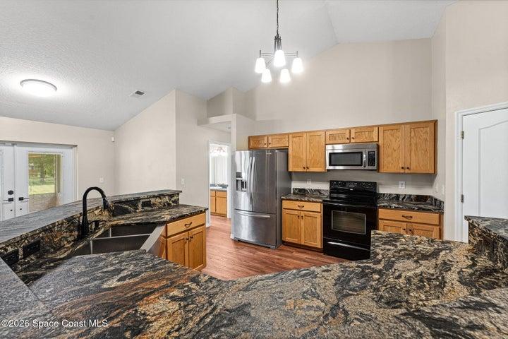 Well-appointed kitchen with ample cabinetry and counter space