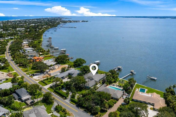 Direct Indian River/Intracoastal waterfront with navigable water, private dock and boat lift.
