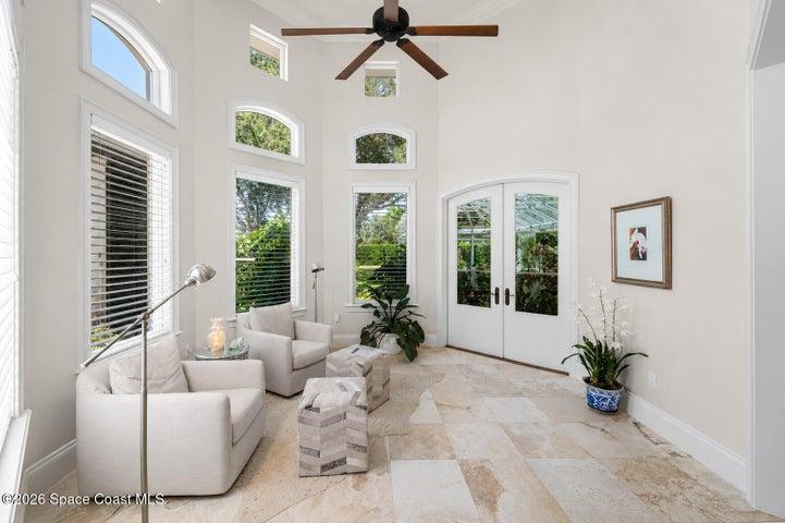 Garden sitting Area w/ Double Doors leading to the Green House/Antrium
