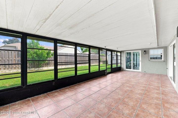 Accessible from living room, kitchen and primary bedroom