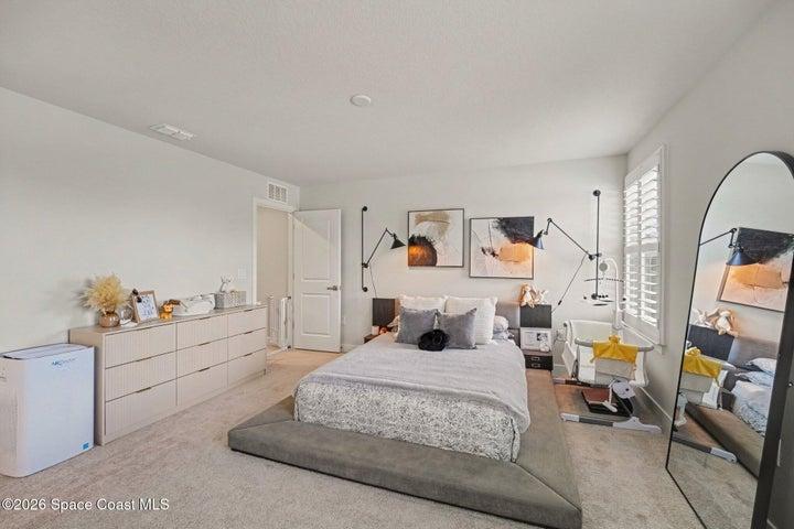 Lots of light in this primary bedroom.