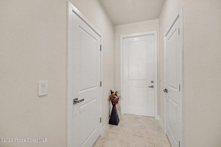 Front entry with half bath downstairs.