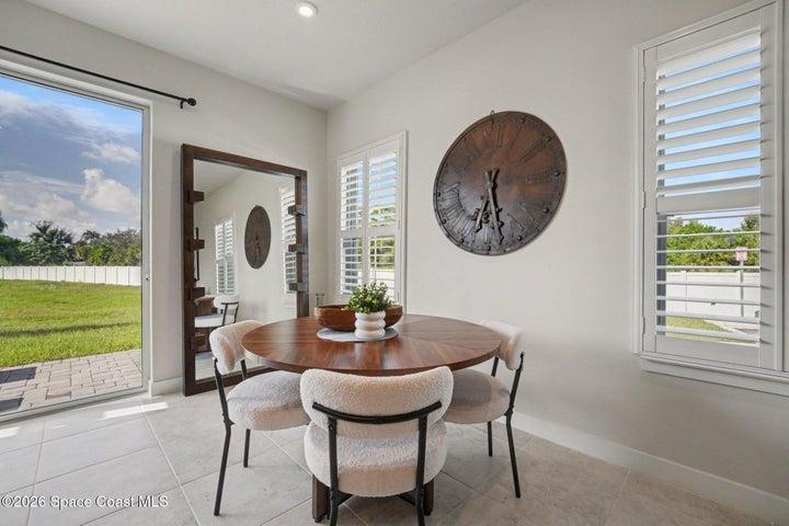 Dining area. Plantation shutters throughout entire home.