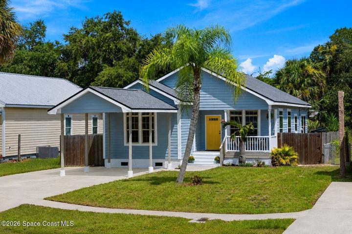 Located in Rockledge. Your own Cottage Style Living! Charming cottage-style home with inviting front porch, cheerful entry and covered carport offering classic Florida curb appeal.