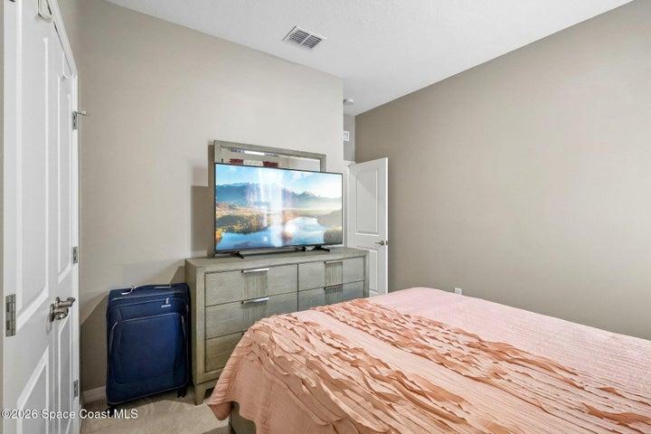Quiet guest quarters tucked away from other bedrooms.