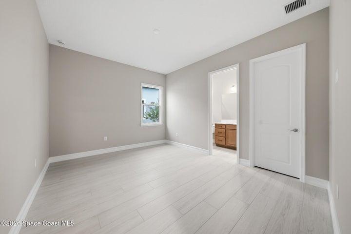 downstairs second primary/guest suite