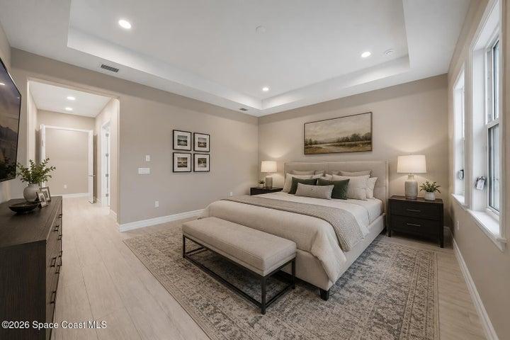 *virtually staged primary bedroom