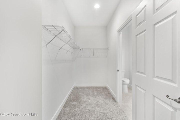 Oversized Primary bedroom Walk in Closet.