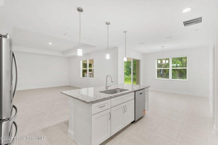Natural light streams through the main living areas, making the home bright and inviting.