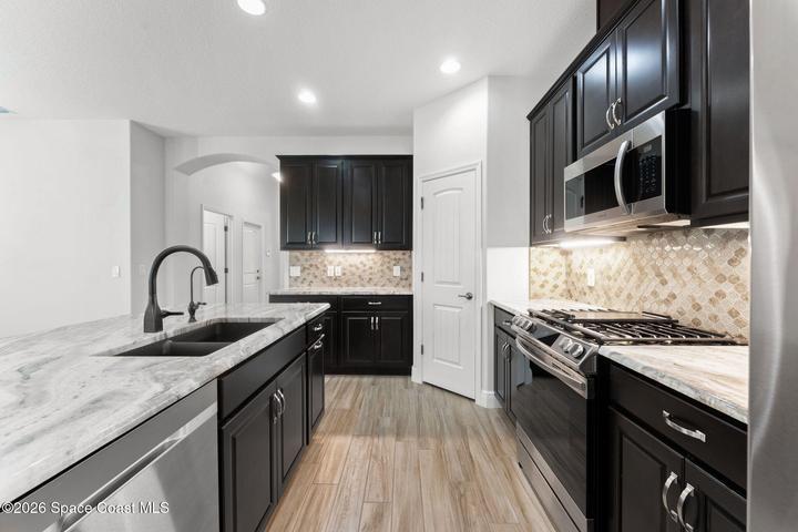 Bright kitchen with easy access to dining and living areas