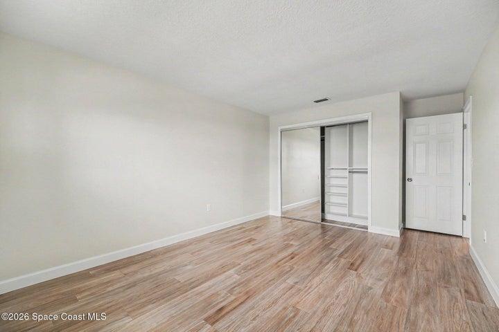 Guest bedroom #1 with closet organizer
