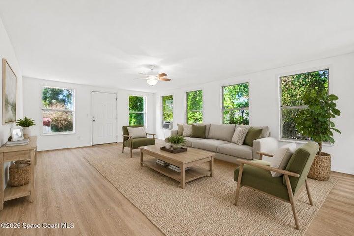 The large sunroom provides endless possibilities for a home office, playroom, gym, or additional living area.