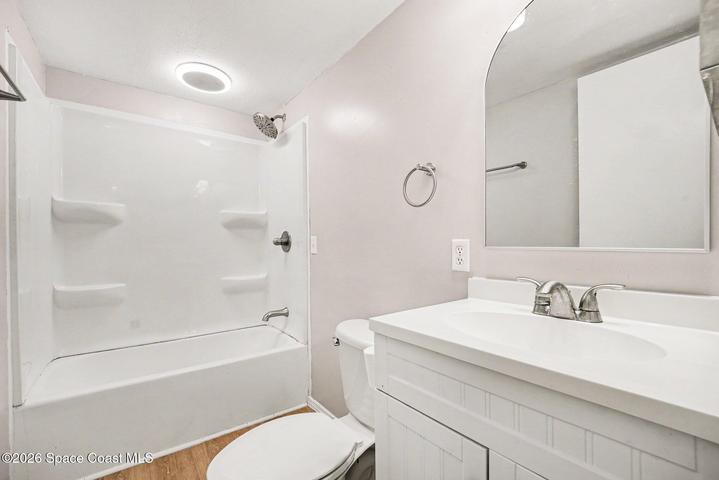 Updated! New Vanity, New Tub with Build-In Shelving, & Lighting