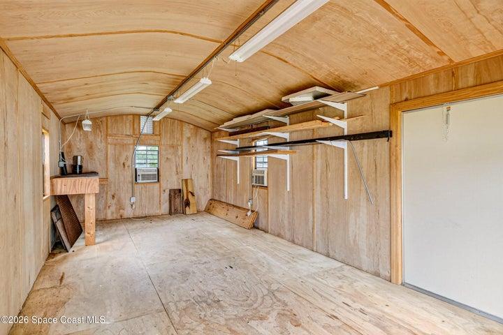 Large insulated shed/2 ac units/110 power available/roll down door