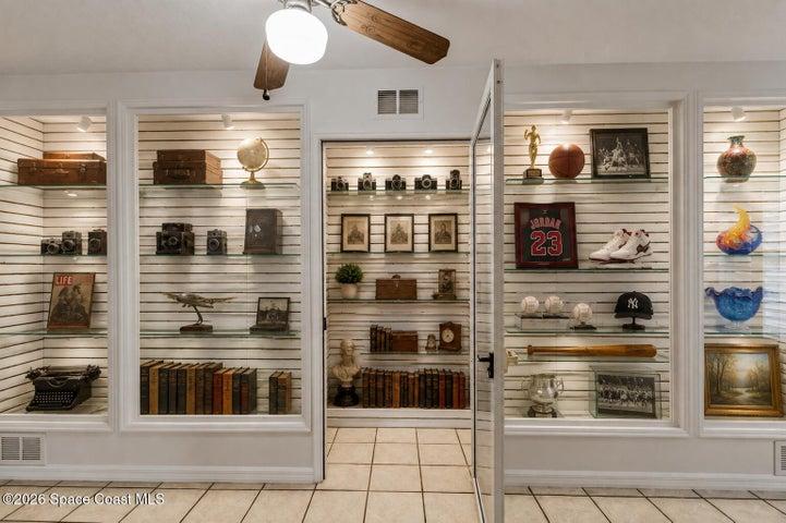 Virtually Staged. Can be used to display collectibles, trophies, awards or books