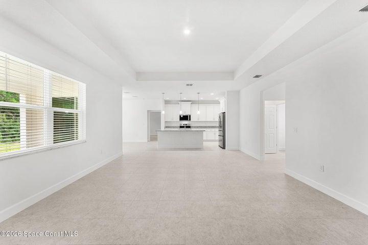 Tile throughout the main living spaces for everyday durability.