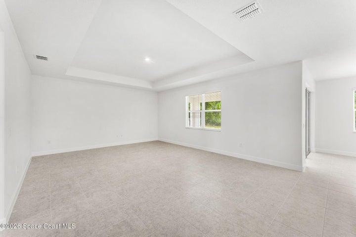 Great Room with tray ceilings