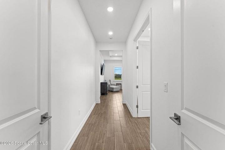 hallway to primary bedroom
