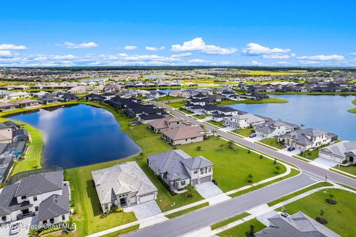 Stunning aerial view showing the home’s proximity to the water