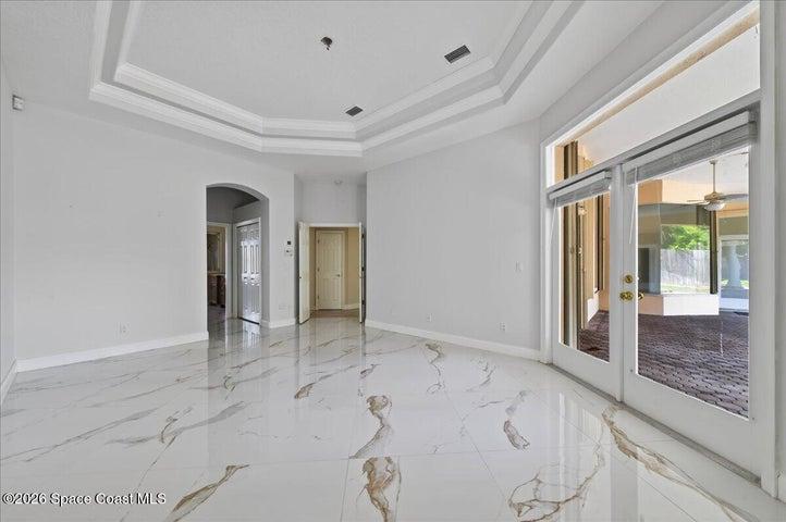 Primary with Marble floors and Tray Ceiling