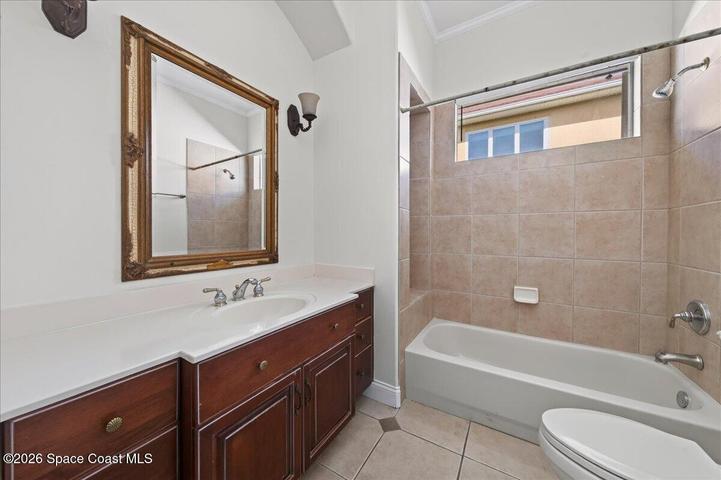 Hall Bath with tub/shower and single sink