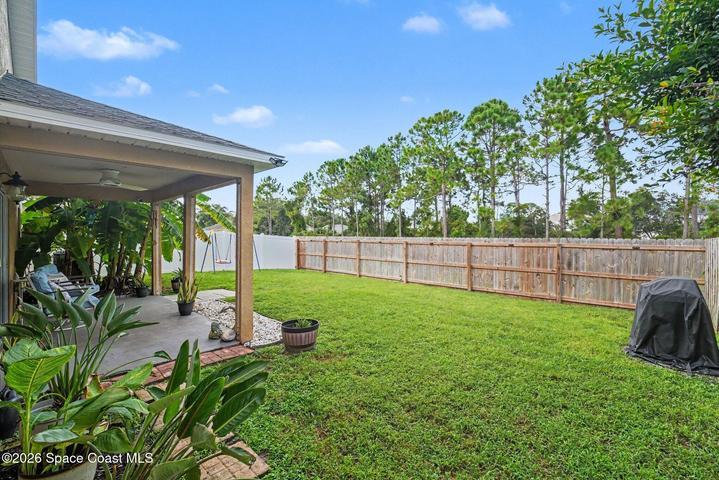 Private Preserve Behind Wood Fence.