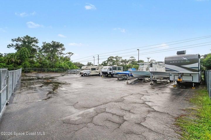 Alongside Community Pool and Community Clubhouse side parking lot.