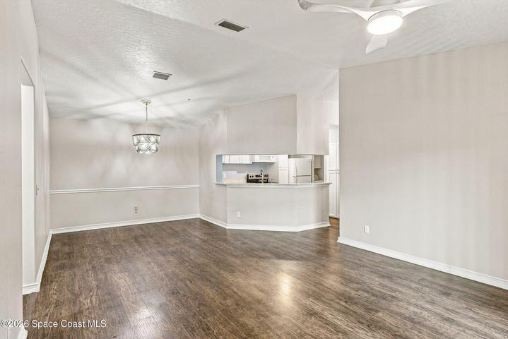 View from living to dining/kitchen area