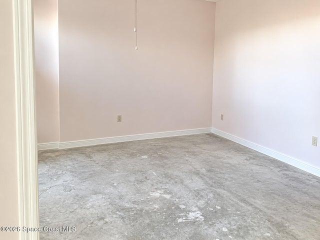 This is NOT one of the four bedrooms. Would make a great office or formal living room, etc...(Extra new flooring to match laminate in rest of house is there)