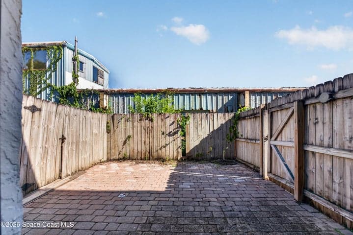 private fenced patio