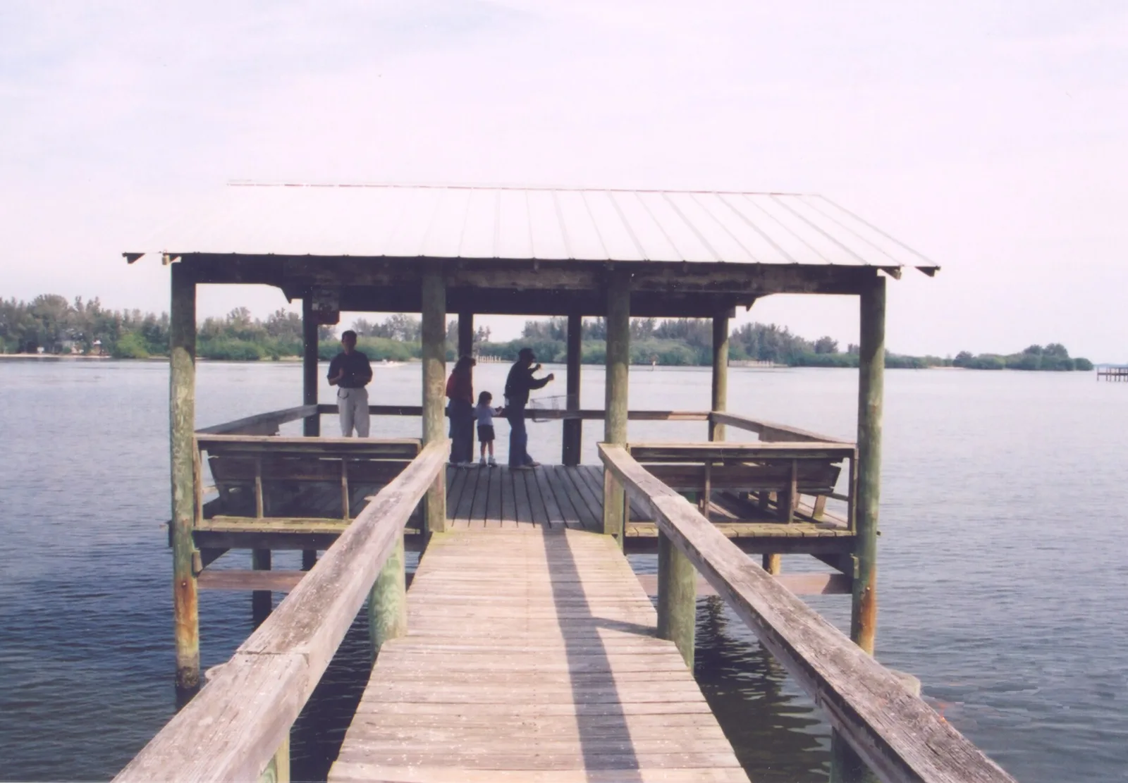 A covered pier reaching into the Indian River Lagoon near Grant