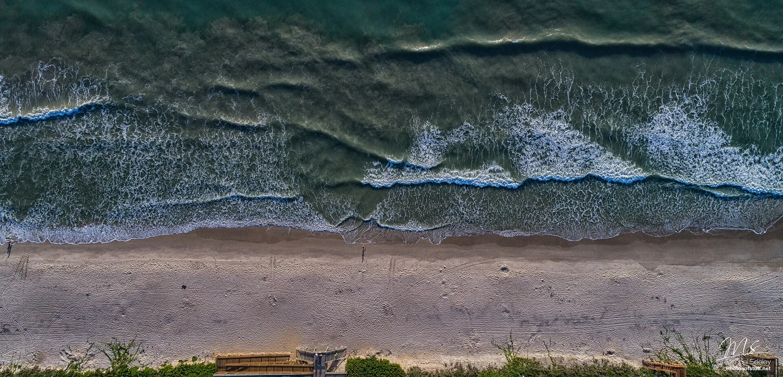 Sea turtle tracks on the morning sand at Indian Harbour Beach, from the air