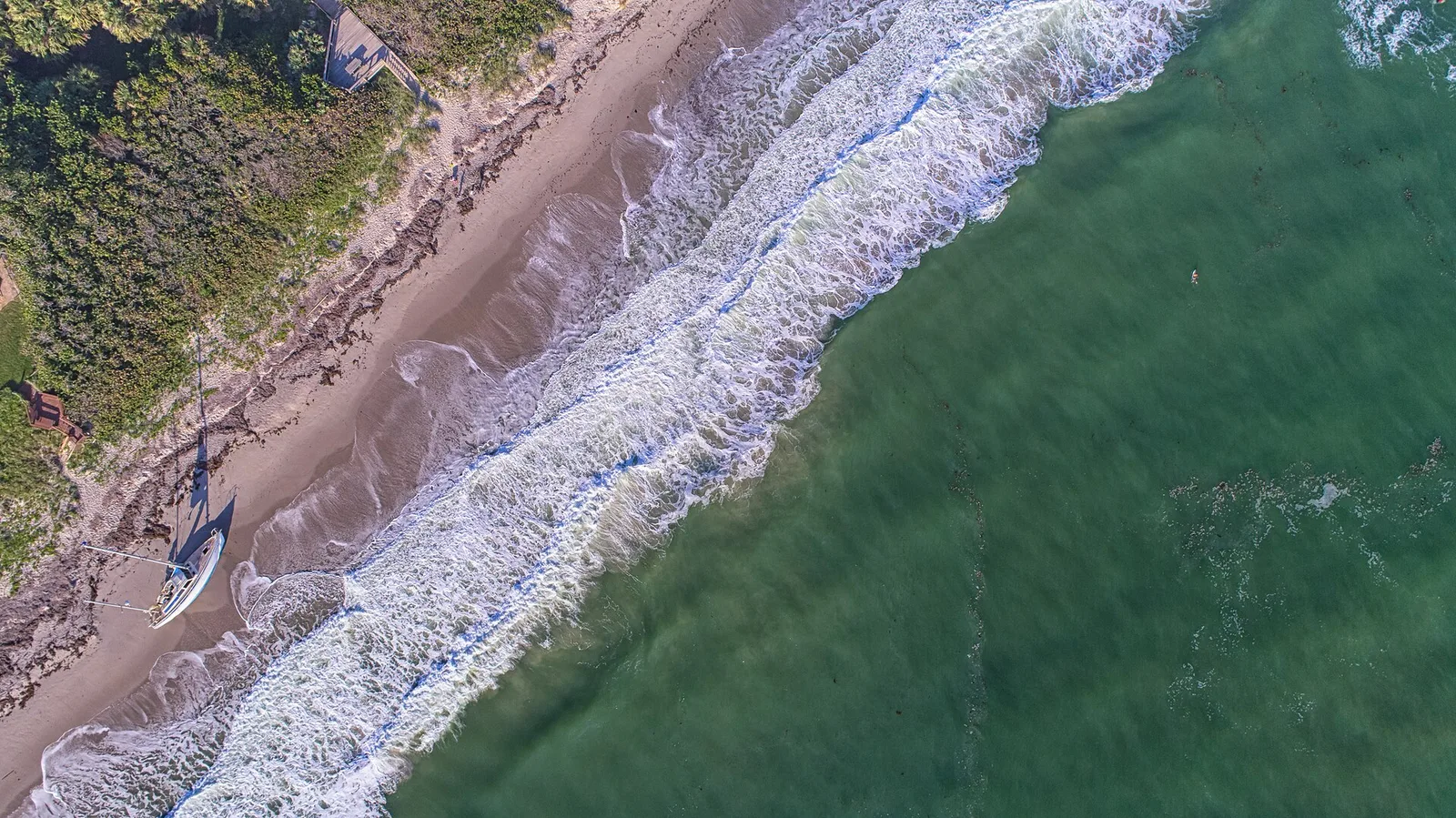 Morning aerial view of the shoreline at Melbourne Beach